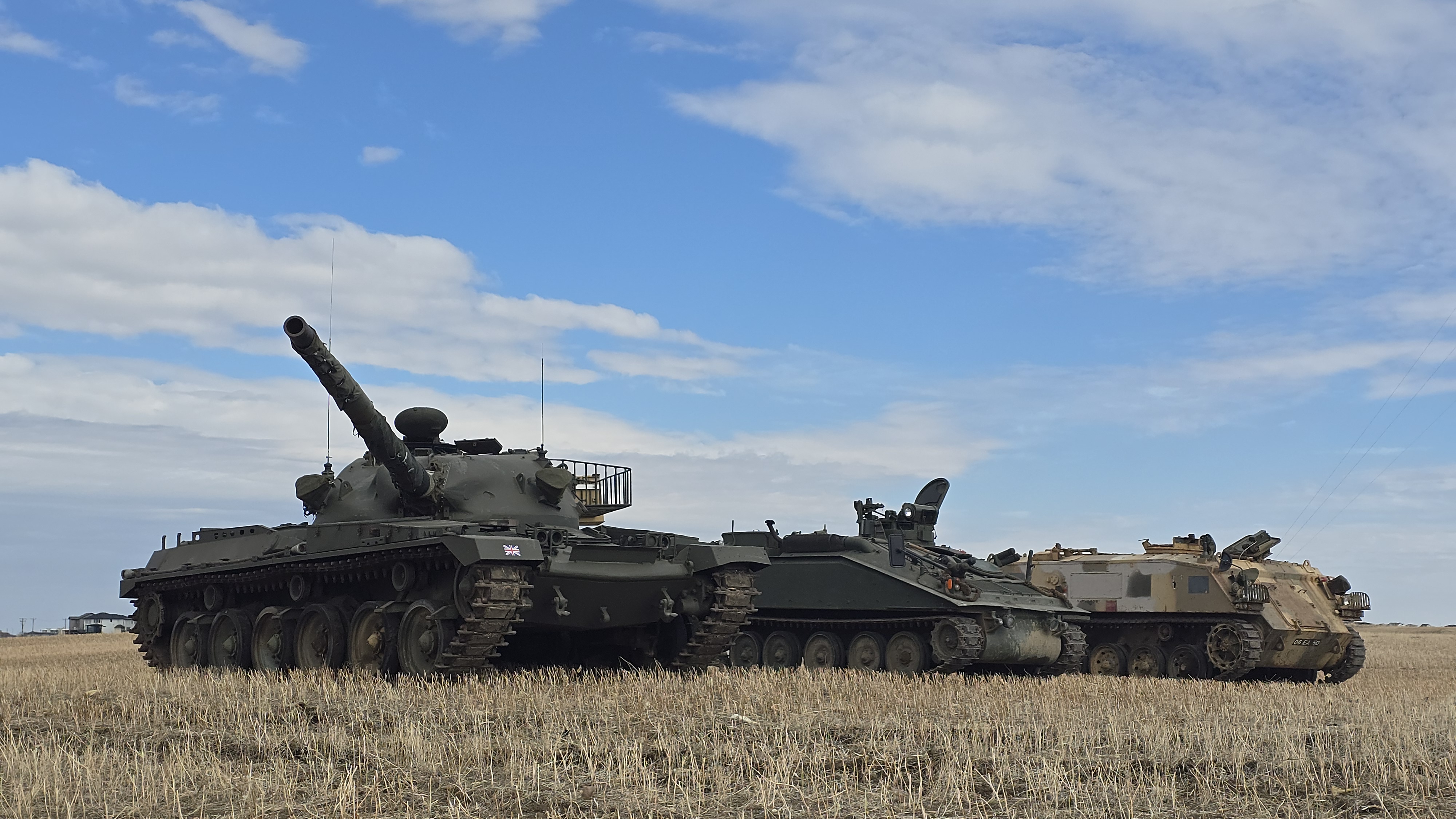 Chieftain tank and armoured vehicles in a field